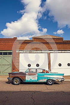 Vertical shot Edsel corsair with building in the background