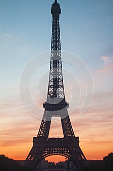 Vertical shot of Eiffel Tower Paris France with sunset background