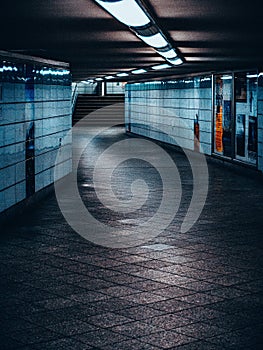 Vertical shot of an empty subway station corridor