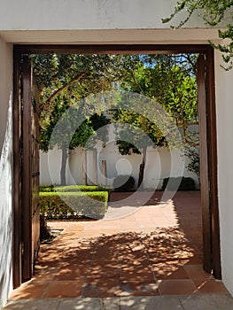 Vertical shot of an entrance to a garden