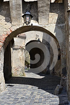 Vertical shot of the entrance to the Medieval Fort located in Sighisoara, Romania