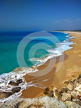 Vertical shot of Estrecho Natural Park beach in Tarifa, Spain photo