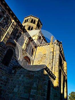 Vertical shot of the exterior of Abbatiale Saint Austremoine Romanesque church in Issoire, France