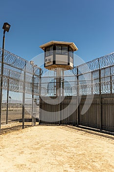 Vertical shot of Exterior Prison Yard Empty with guard tower