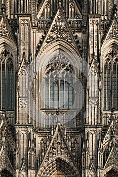 Vertical shot of the facade of the Cologne Cathedral with decoration and ornaments, Cologne, Germany