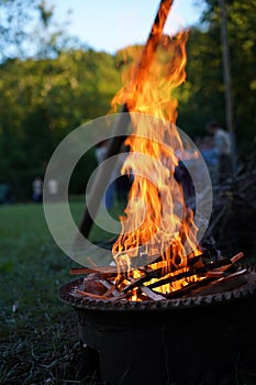 Vertical shot of a fire pit on a weekend picnic gathering