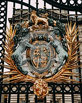 Vertical shot of the gates of Buckingham Palace at daytime in London, England