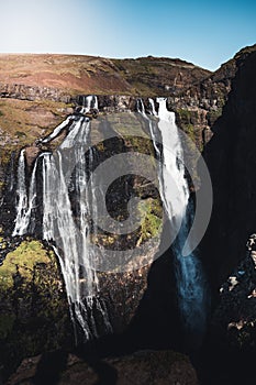 Vertical shot of the Glymur, the second highest waterfall in Iceland