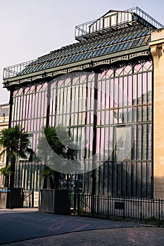 Vertical shot of a greenhouse in the Garden of Plants in Paris, France photo