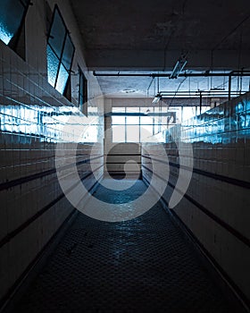 Vertical shot of the hallway in abandoned hotel in Portugal