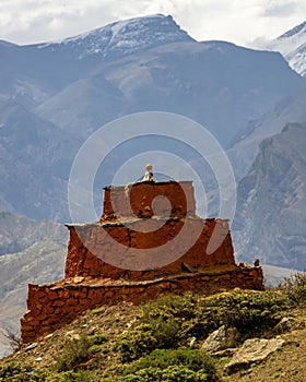 Vertical shot of the historic Tibetan Buddhist holy site Ghar Gumba Monastery in the Himalayas