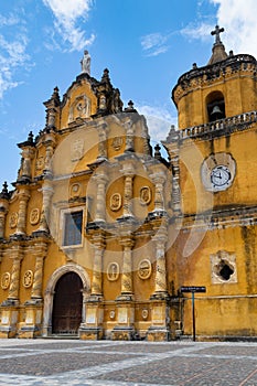 Vertical shot of the historic yellow Church of the Recollection in Leon, Nicaragua photo