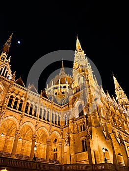 Vertical shot of the Hungarian Parliament building in Budapest at night