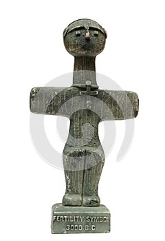 Vertical shot of the Idol of Pomos against a white background