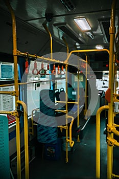 Vertical shot of inside of empty public bus