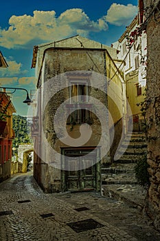 Vertical shot of the Itri alley in a village in Lazio, Italy photo