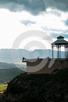Vertical shot of La Sevillana, a beautiful viewpoint spot in Ronda, Spain. photo