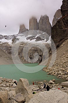 Vertical shot of a lake surrounded by rocks in Torres del Paine National Park, Chile