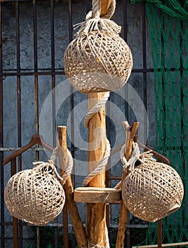 Vertical shot of lantern covers made of abaca ropes
