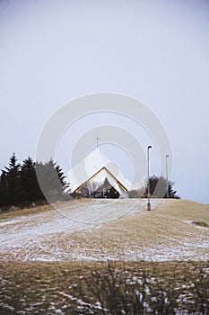 Vertical shot of the Library Monique-Corriveau on the snowy hillside
