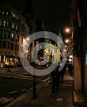 Vertical shot of Ludgate Hill and St. Pauls at night