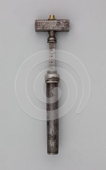 Vertical shot of a medieval hummer maul isolated on a white background