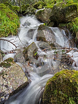 Vertical shot of a messy waterfall