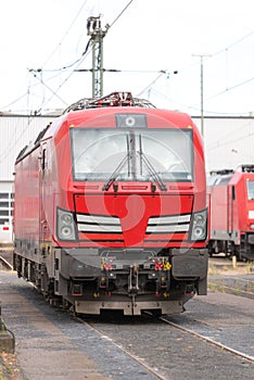 Vertical shot of a modern electric locomotive during daylight