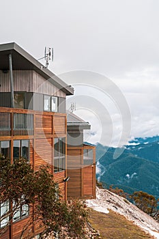 Vertical shot of modern houses near the mountains