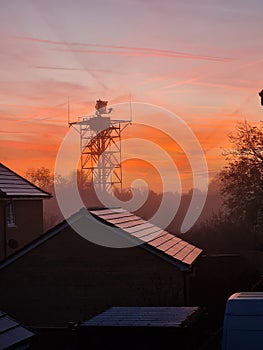 Vertical shot of modern houses at sunrise in England