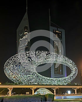Vertical shot of the Museum of the Future in Dubai at night