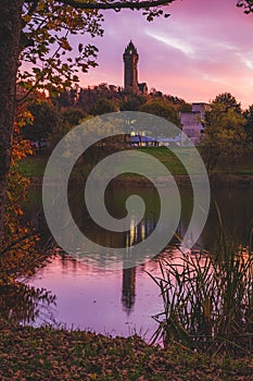 Vertical shot of the National Wallace Monument during a pink sunset