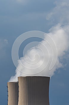 Vertical shot of nuclear power plant cooling towers