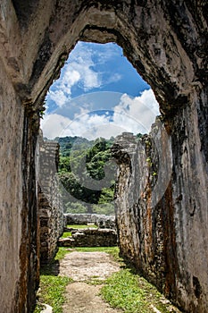 Vertical shot of the old stone arch of the fortress in the nature