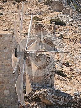 Vertical shot of old windmills in Crete, Greece