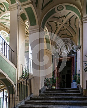 Vertical shot of Palazzo dello Spagnolo in Rione Sanita, Naples, Italy photo