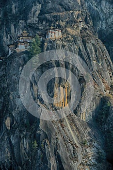 Vertical shot of the Paro Taktsang monastery Vajrayana Himalayan Buddhist site in Bhutan photo