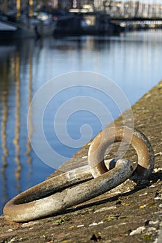 Vertical shot of a part of the quay wall in the historical Dutch harbor town Hellevoetsluis