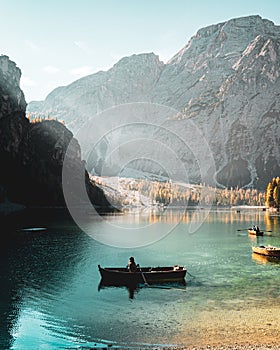 Vertical shot of a person sailing in Parco naturale di Fanes-Sennes-Braies Prags, Italy