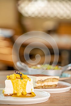 Vertical shot of a piece of cheesecake