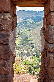 Vertical shot of the Pisac City Trough the Window of Ancient Incan