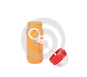 Vertical shot of a plastic bubble wand bottle on a white background