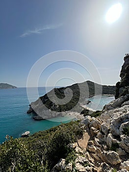 Vertical shot of the Porto Timoni beach with a beautiful seascape in the background