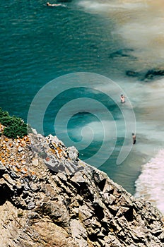 Vertical shot of Praia da Ursa in Sintra, Portugal