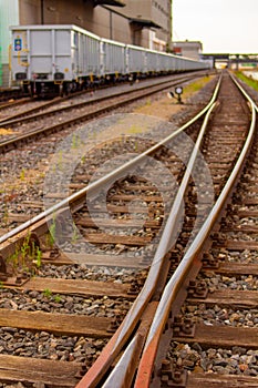 Vertical shot of railroads  and a train container