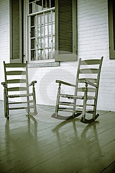 Vertical shot of rocking chairs on the porch at the Carnton Mansion in Tennessee