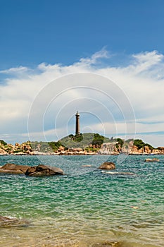 Vertical shot of rocky coast near Hai Dang Mui Ke Ga Ke under blue sky in Vietnam