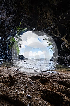 Vertical shot of the rocky Turtle Cove in North Shore, Kauai, Hawaii