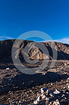 Vertical shot of the rocky volcanic landscape in the Volcan Poas National Park in the Alajuela province of Costa Rica