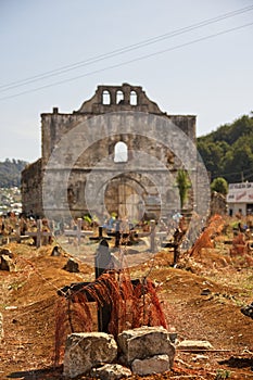 Vertical shot of a ruined church in San Juan Chamula Cemetery in Chiapas, Mexico